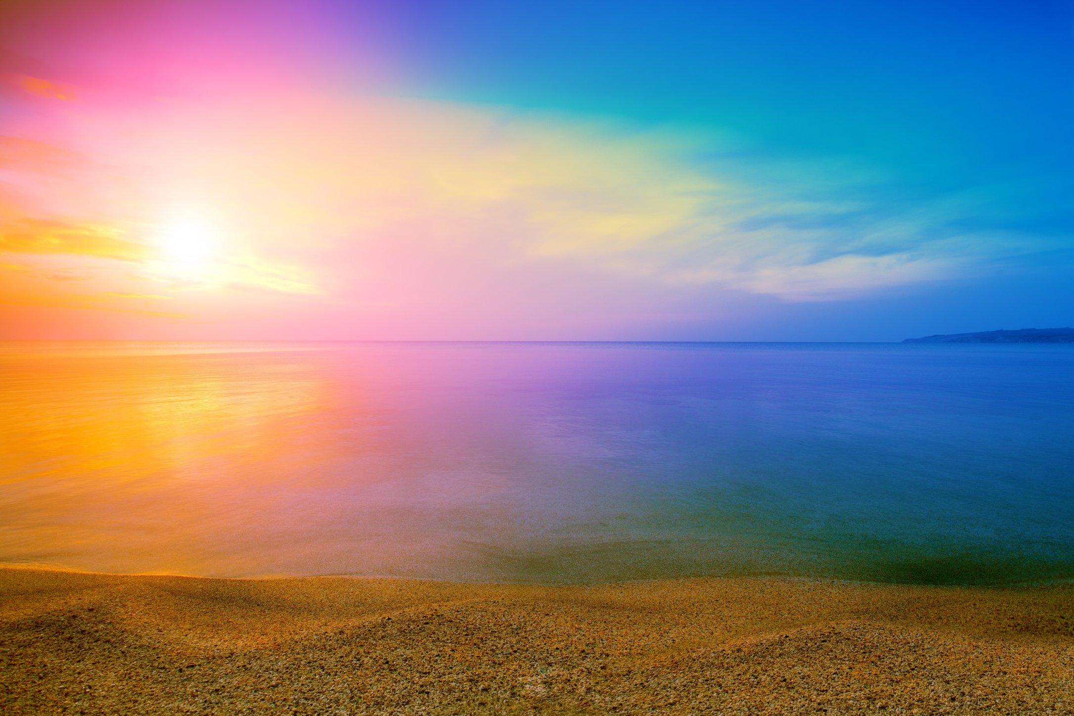 Magical rainbow sunrise over sea